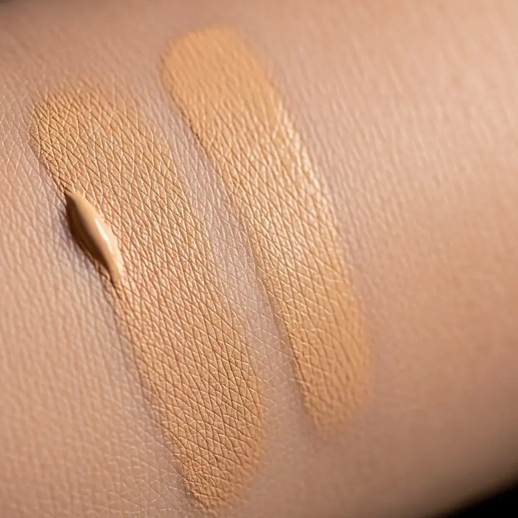 Stick foundation texture melting into mature dry skin showing seamless blending and hydration